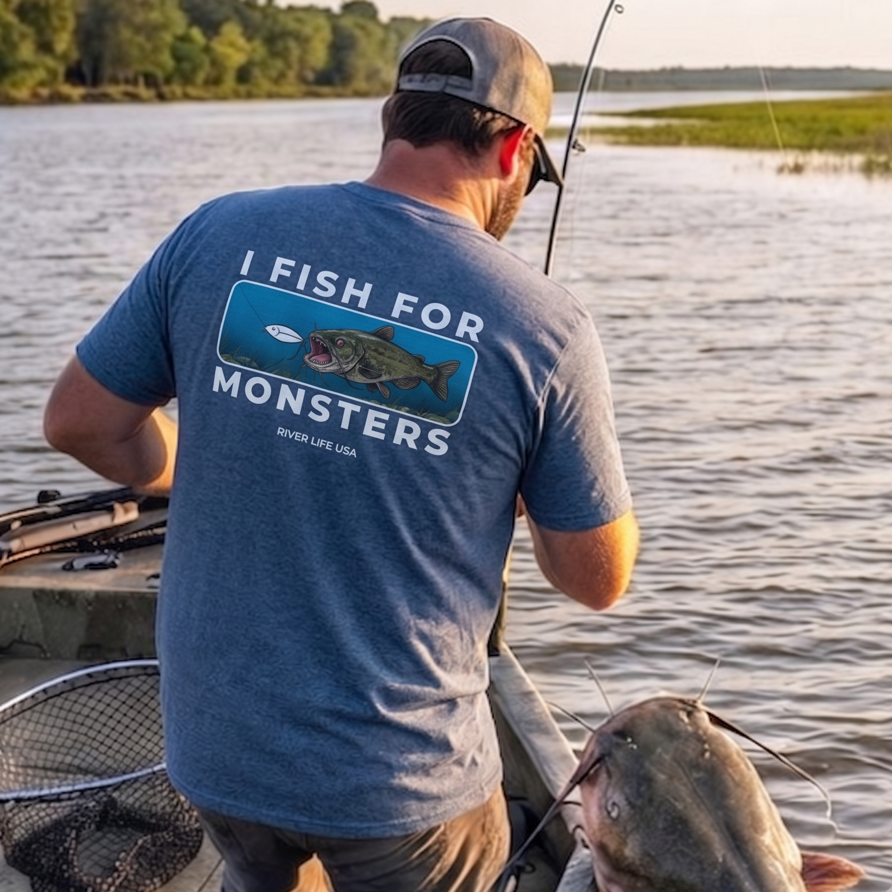 I Fish For Monsters - Catfish (white print) | Short-Sleeve Unisex T-Shirt-Heather Indigo-River Life USA